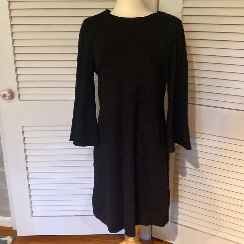 Thick black dress from the Limited. Made from nylon, rayon and spandex.